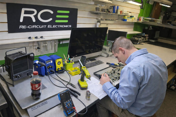 Re-Circuit Electronics technician rebuilding a GM truck instrument cluster at the Toledo shop